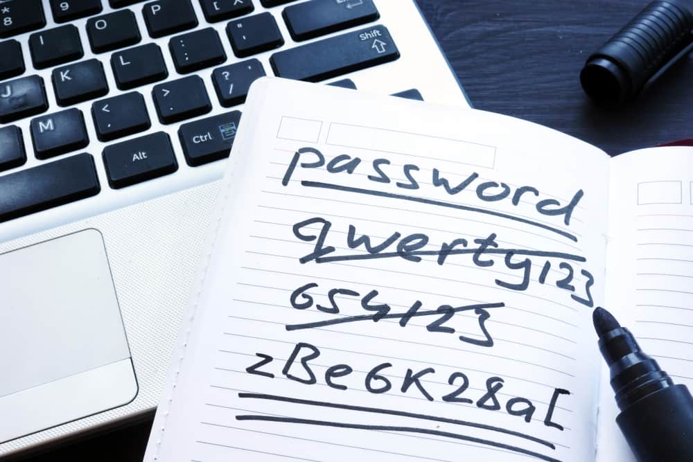 Strong and weak easy Password. Note pad and laptop