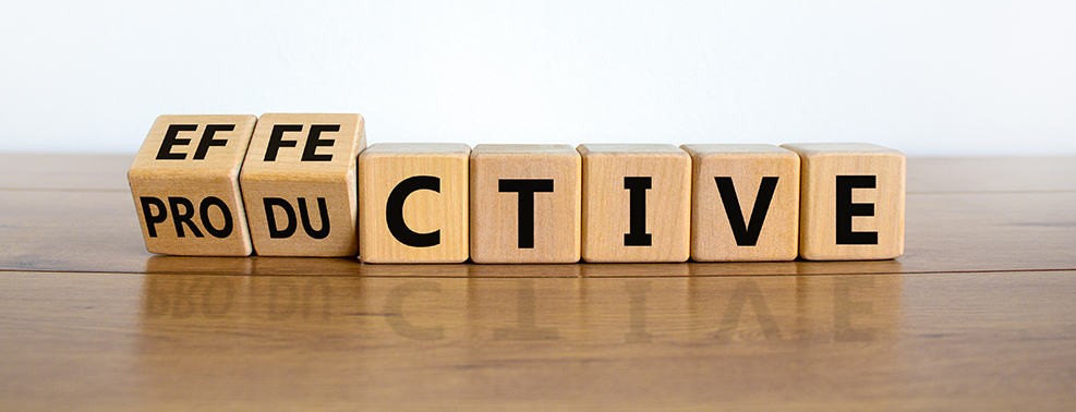 an image with cubes who change the word productive to effective