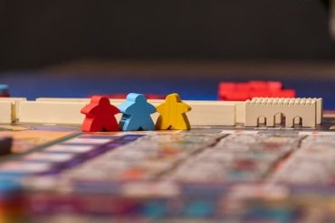 Red, Blue, and Yellow Meeple Figures